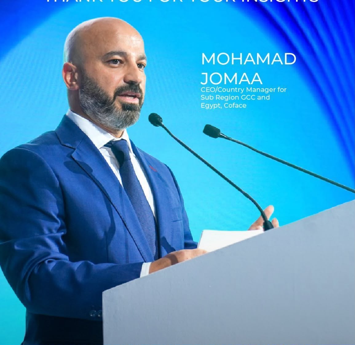 Speaking at podium